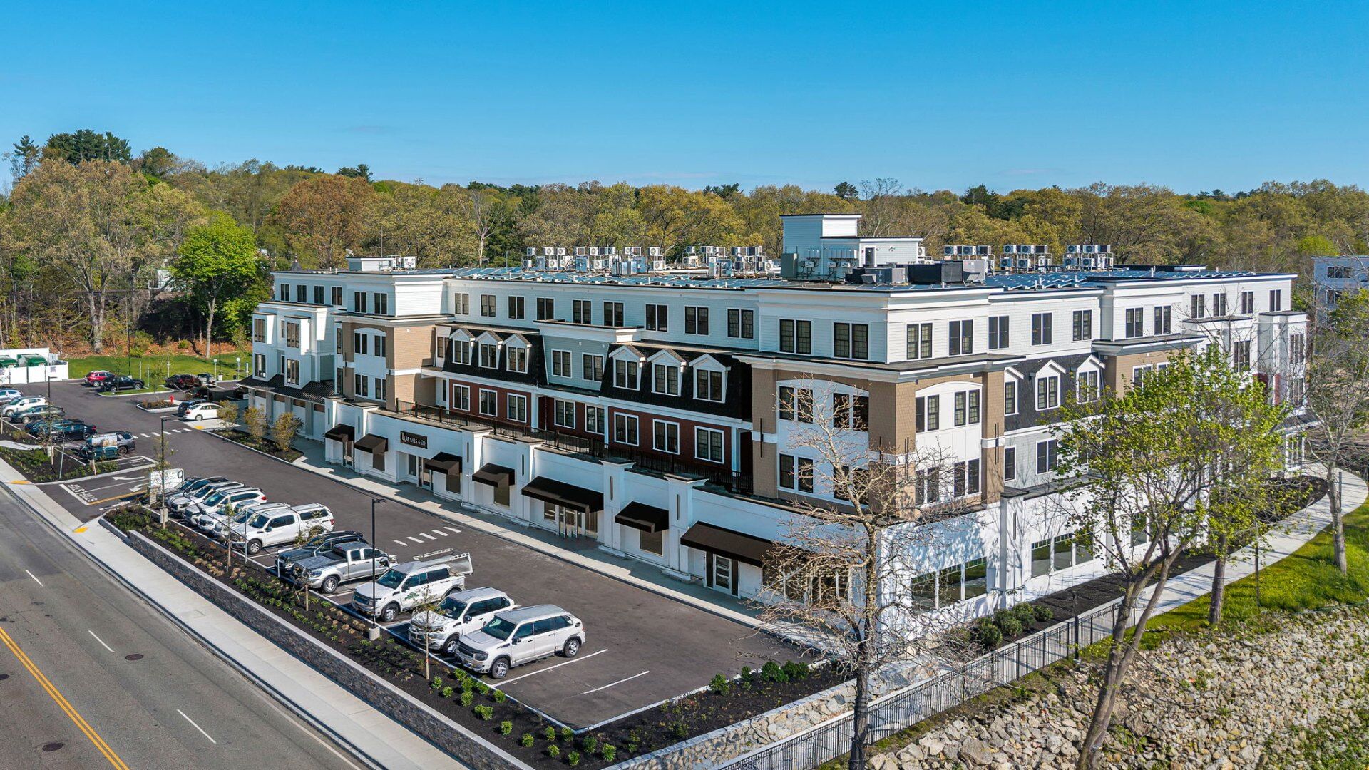 Aerial view of a Supreme Companies mixed-use development and parking